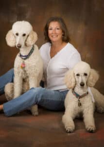 Two dogs with there owner in the studio for a pet portrait