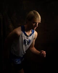 Athlete in Maine with dramatic lighting